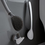 Brosse-de-toilette-courbee-en-silicone-avec-support-couleur-blanc-gris-presentation-lepetitcoindesign.com